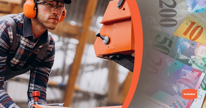 A man wearing headphones is cutting money on a saw.