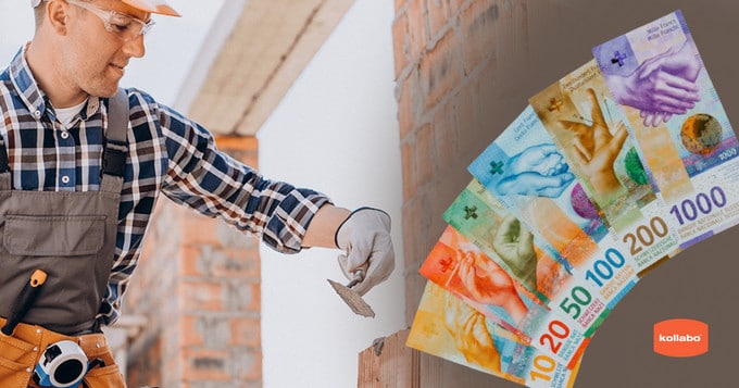 Ein Mann arbeitet mit einem Stapel Geldscheinen an einer Mauer.